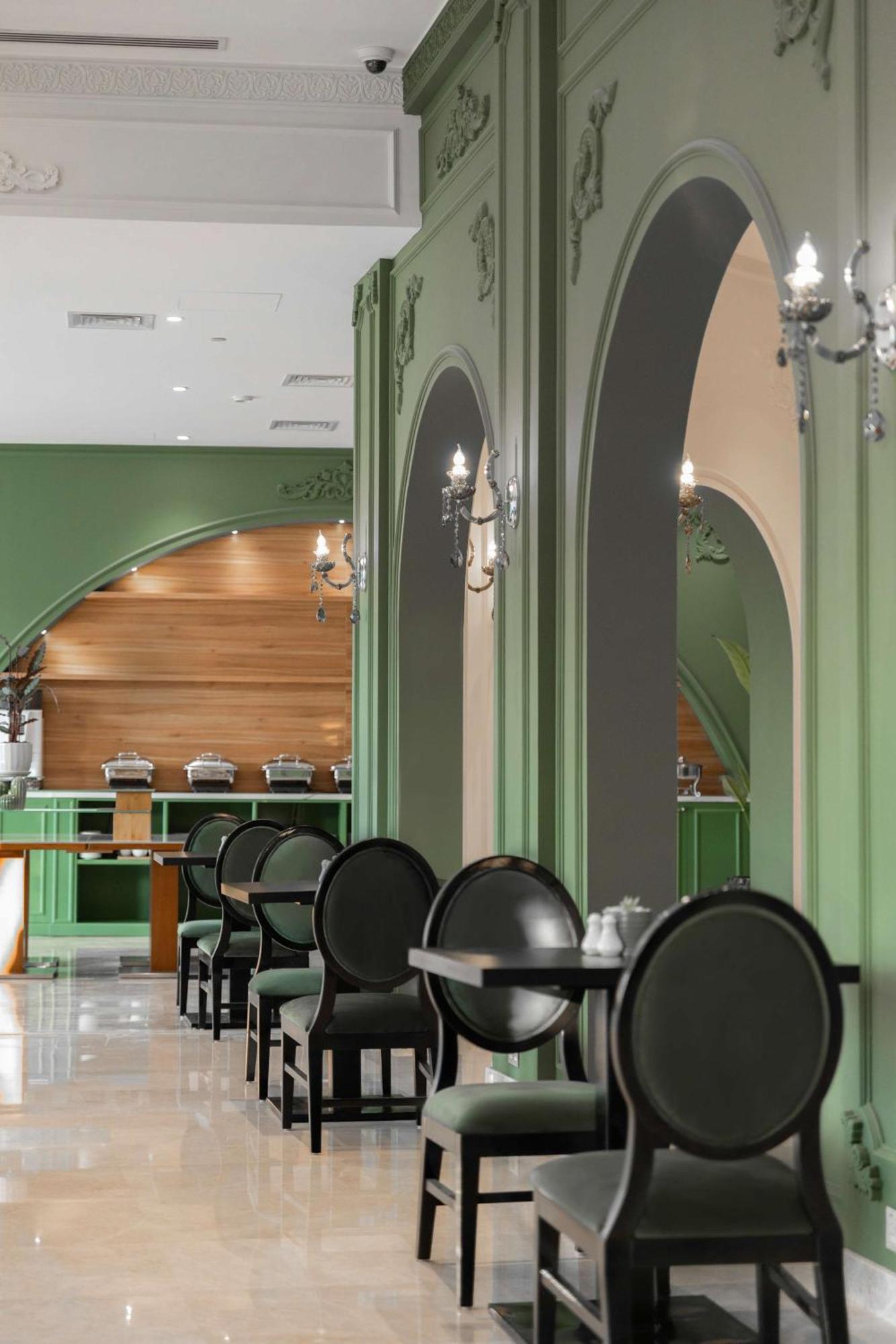 Levatio Suites Mascate Esterno foto The interior of the restaurant